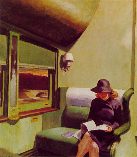 Galeria - czytająca w pociągu.jpeg